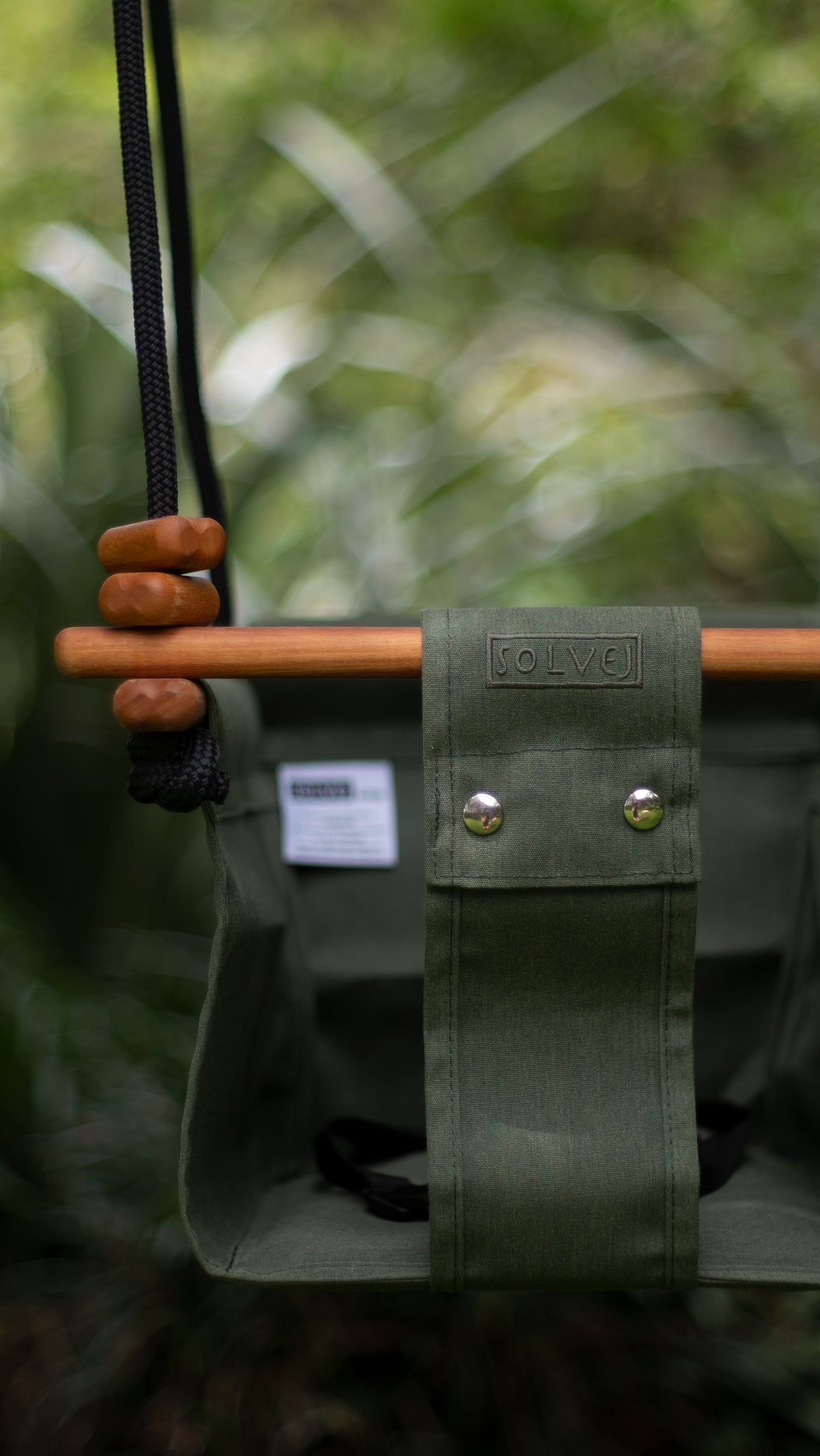 Outdoor swing set swing in natural green