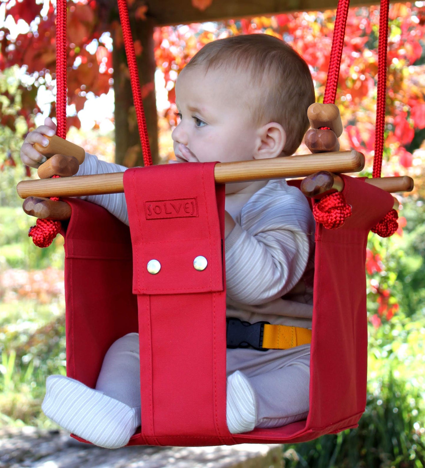 Outdoor sensory swing in red
