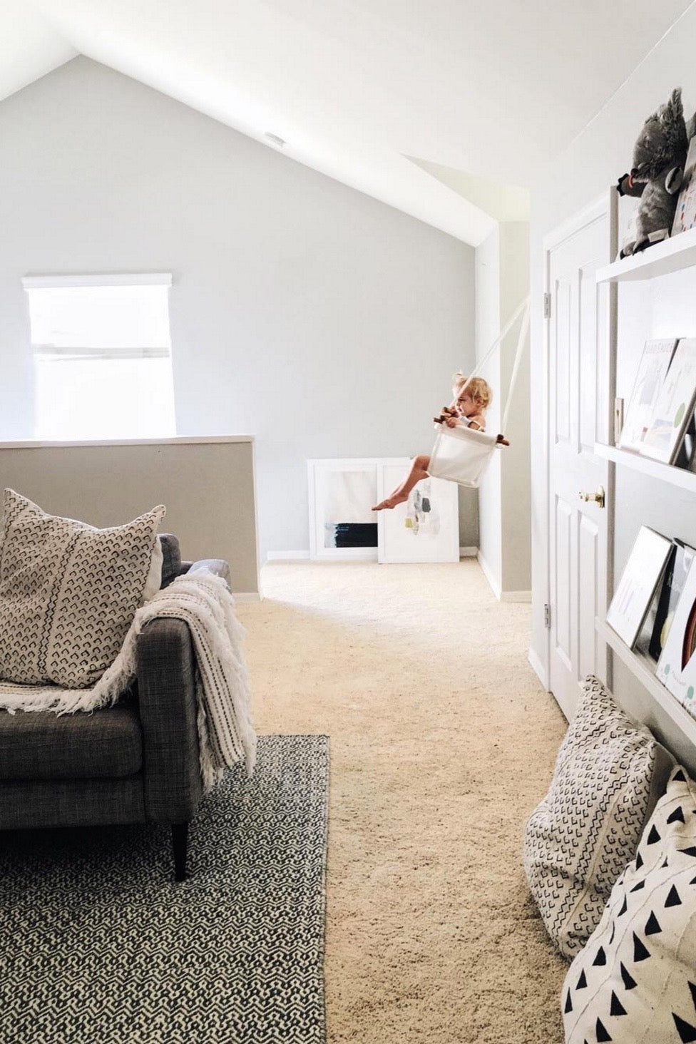 natural sensory swing, heirloom baby swing in lounge in white